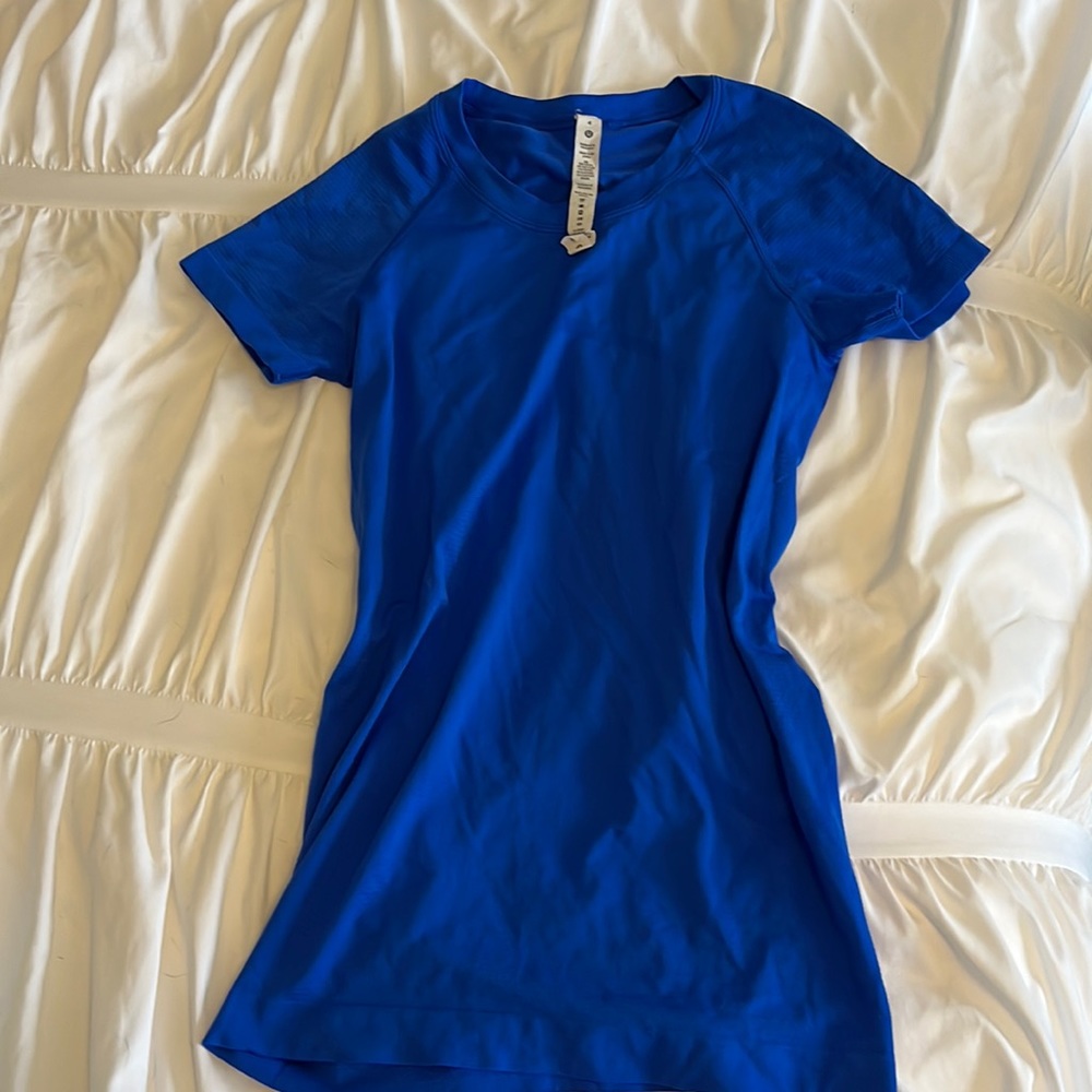 Lululemon Swiftly Tech, full length, in Electric Blue.